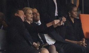 Helle-Thorning Schmidt poses with David Cameron and Barack Obama at the Mandela memorial service